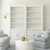 Front view of the Stonefield Double Bookcase Wall Unit in situ in a Modern Classic living room