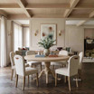 Styled view of the Birkhall Round Dining Table with cabriolet feet by Thomas and Hurley with smooth circular profile, ideal for Hamptons dining spaces and modern contemporary interiors, and paired here with the Stratford Dining Chairs.
