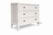 A front angled view of the Lando 3 Drawer Chest in white showcasing streamlined design, a lightly tapered leg, and functional storage.