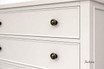 The Lando 6 Drawer Chest detailed view, showcasing accent handles and handcrafted design.