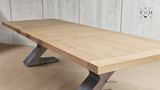 Elevate your dining experience with the Quinn Table, a symbol of modern elegance and flexibility.