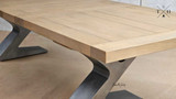Quinn's sleek extendable table, designed for contemporary spaces, offers unmatched versatility.