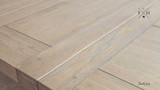 Quinn Table's unique metal base and extendable design offer a perfect blend of style and practicality.