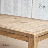 Image detailing where the solid legs meet the tabletop, emphasizing stability