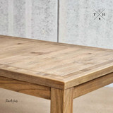 View focusing on a table leg and its contact with the floor for stability