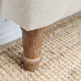 Image focusing on the hand-carved solid oak corbelled feet, demonstrating the craftsmanship