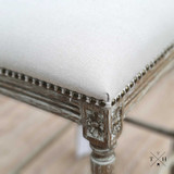 Close-up shot focusing on the comfortable seating area and studded detail