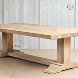 The Charlested Oak Dining Table in full view, showcasing its classic design and sturdy oak construction.