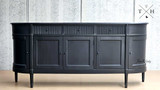 Image capturing the symmetrical design of the Louis Buffet’s front, emphasizing elegance