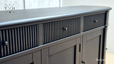 Detailed close-up of the intricate grooved detailing on the drawers of the Louis Buffet.