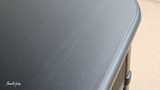 Close-up on the Louis Buffet’s wood grain and quality finish.