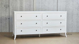 Angled view of the Piastri Chest displaying the three spacious drawers.