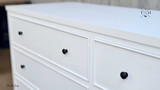 Close-up of the chest edge detailing the paint stroke finish.