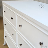 Angled top-down view of the Piastri Chest highlighting the top surface and drawer layout.