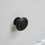 Close-up of the drawer handle detailing the elegant hardware.