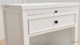 Close-up of drawer front of Piastri 1 Drawer Nightstand showcasing the hand-carved molding.