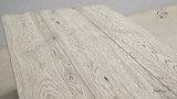 Shot of the Trailbridge Canyon Coffee Table's surface texture, capturing the natural beauty and grain of the greige wash oak.