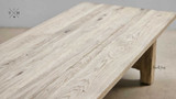 Top-down view of the Trailbridge Canyon Coffee Table featuring the spacious and beautifully finished oak surface.