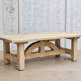 Side view of the Trailbridge Canyon Coffee Table revealing the unique craftsmanship and rustic charm of the oak legs.