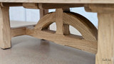 Close-up of the leg of the Trailbridge Canyon Coffee Table, showcasing the natural texture and quality of the greige wash oak.