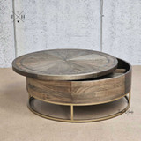 Angular top view, showing the coffee table in a semi-open state, displaying storage