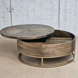 Image capturing the hidden storage compartment with the lid partially open.