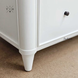 Close-up of the leg design featuring the unique and stable construction.