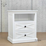 Angled view of the Fremont Bedside Table displaying the unique geometric drawer fronts and timeless design