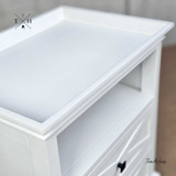 Three-quarter view from the front corner showing the top moulding and side details of the Fremont Nightstand