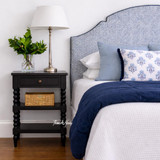 A styled front view of the Montclair Side Table in Black by Thomas and Hurley.