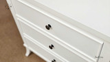 Close-up of the bedside table's surface, highlighting the finish and quality craftsmanship