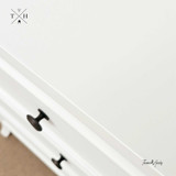 Close-up of the Piastri 3 Drawer table white paint stroke finish