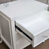 Close-up of drawer interior showing the spacious storage area and metal drawer runners.