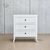 Full frontal view of the Piastri 3 Drawer Bedside Table, showcasing its clean lines and crisp white finish