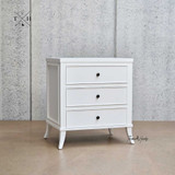 Angled shot displaying the precise joinery and classic design of the bedside table