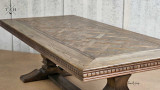 Detailed view of the carved geometric apron on the Bedford Oak Dining Table, emphasising its sophisticated design