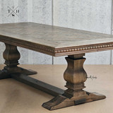 Angled full-length view of the Bedford Oak Dining Table, providing a comprehensive look at its design