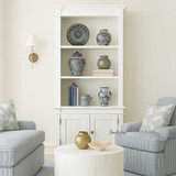 Front on view of the  Stonefield Single Bookcase in situ in a Hamptons style lounge room