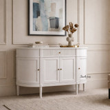 The Louis Buffet 4 Door 130cm in White by Thomas and Hurley, front angle view, styled and closed position, showcasing its curved design, fluted drawer detailing, and functional storage.