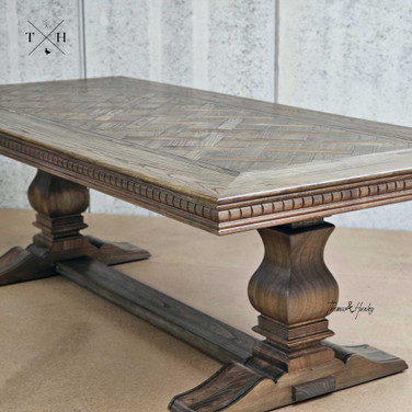 Angled view of the Bedford Oak Dining Table, highlighting the depth and craftsmanship of the design