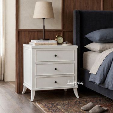 Styled view of the Piastri 3 Drawer Bedside from Thomas and Hurley, showcasing three generous drawers for storage, and streamlined silhouette.