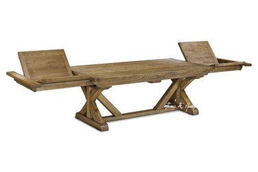 The Hamilton luxury oak double extension dining table with extension leaves open.