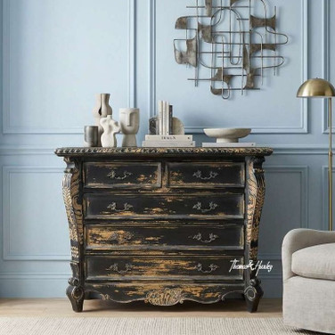 The French provincial inspired Eloise 5 Drawer Chest of Drawers in black, with carved detailing and hand aged paint finish