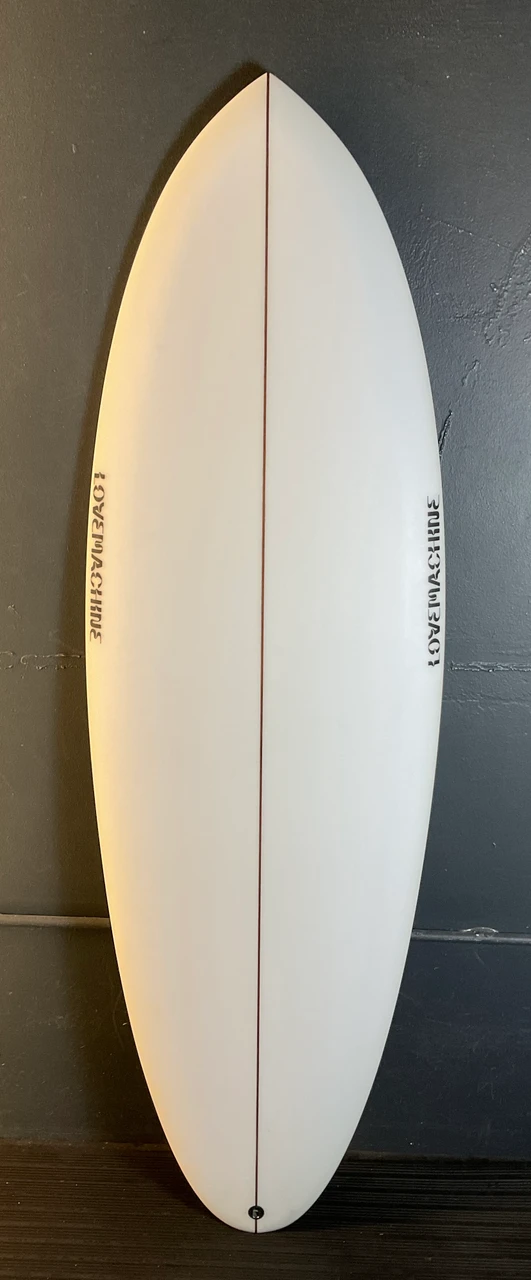 5'8" T. REV photo 1