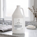 Zents Water Body Wash 1 gallon on bathroom counter