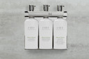 Aquamenities triple chamber wall-mounted dispenser for guest bathrooms