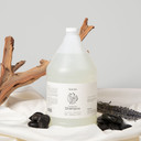 Amenie Salon lavender shampoo gallon bottle with lavender essential oil graphic