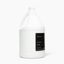 Amenie Sicilian Tangerine Lotion gallon bottle with black label isolated on a clean white background
