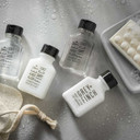 Grey + Finch citrus-scented toiletries in sleek 0.84 oz bottles for hotel guest bathrooms