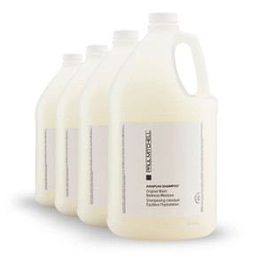 Bulk 4-gallon Paul Mitchell Awapuhi shampoo jugs in spa setting Bulk 4-gallon Paul Mitchell Awapuhi shampoo jugs in spa setting